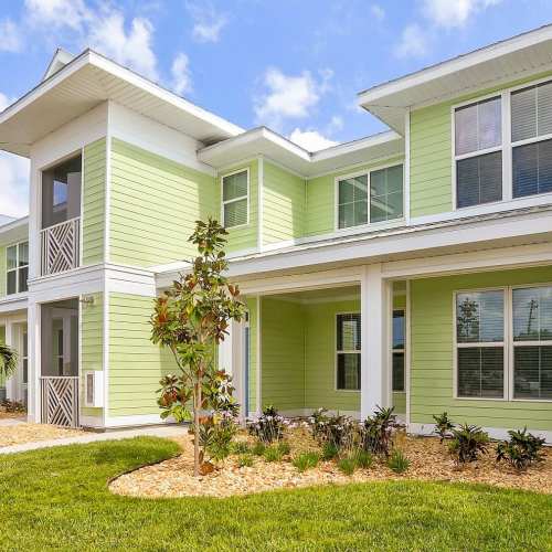 Dog sitting on it's bed at Lemon Bay Apartments in Englewood, Florida