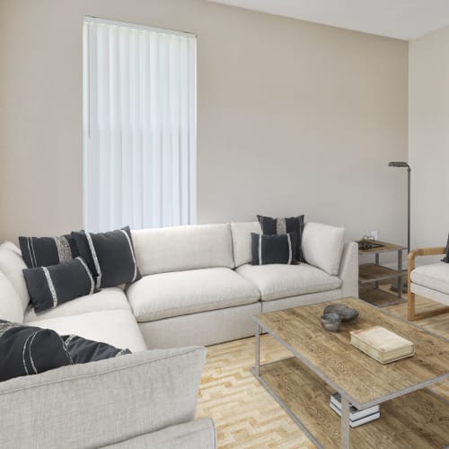 A furnished living room at The Village at Whitehurst Farm in Norfolk, Virginia