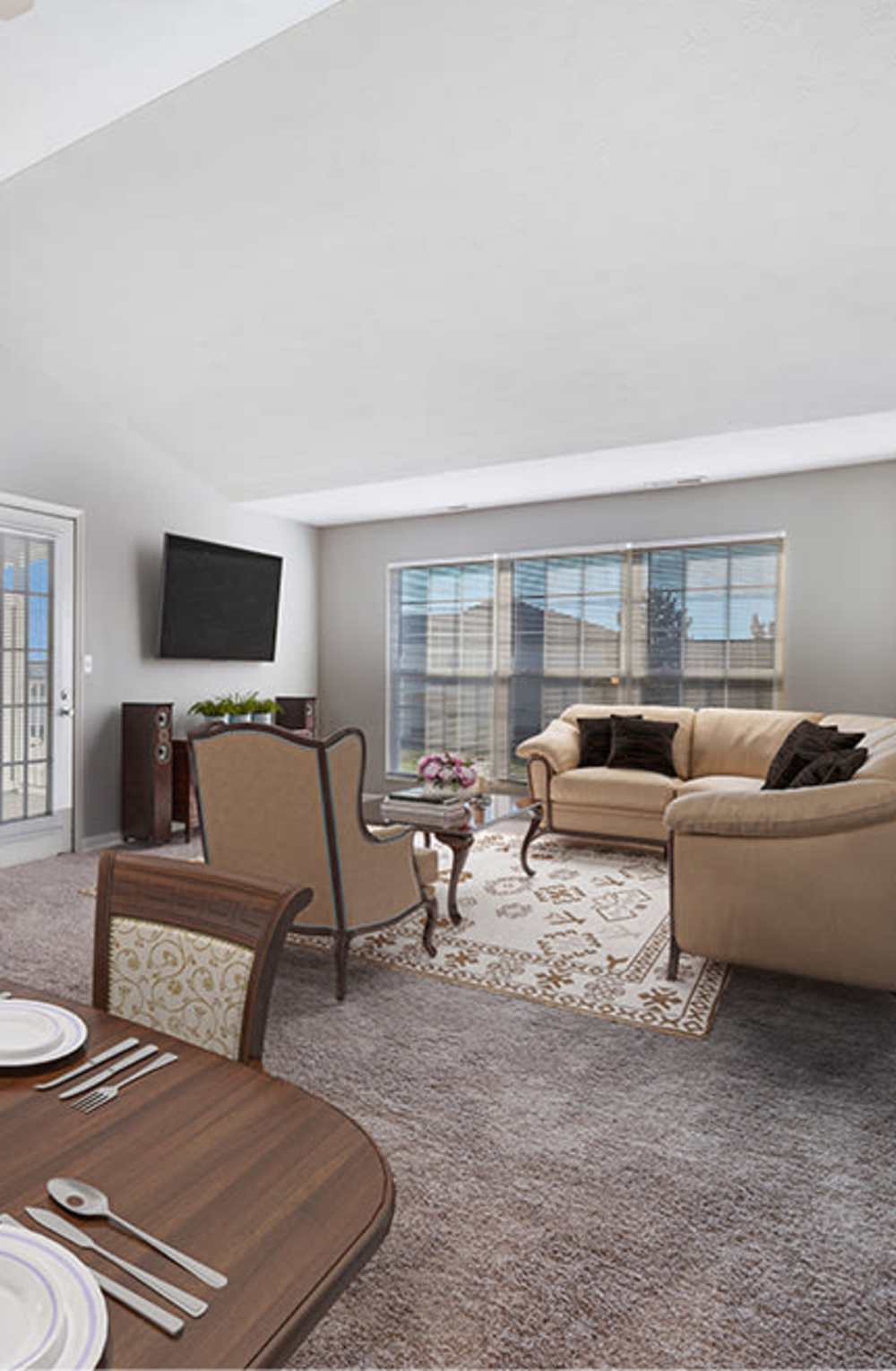 Dining room and living room at Lake Pointe Apartment Homes in Portage, Indiana