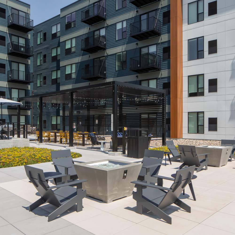 Outdoor seating with firepit at Oaks Pentagon Village in Edina, Minnesota
