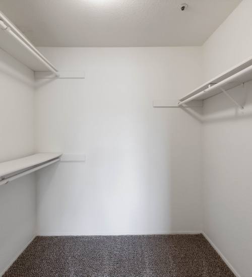 Large walk in closet with shelving at Foundry on Fifth in Renton, Washington