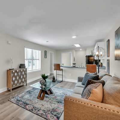 An open kitchen with spacious living area at Woodforest Chase in Houston, Texas