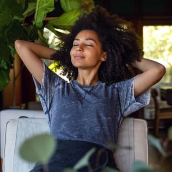 Resident relaxing at home at Addison Park Apartments in Louisville, Kentucky