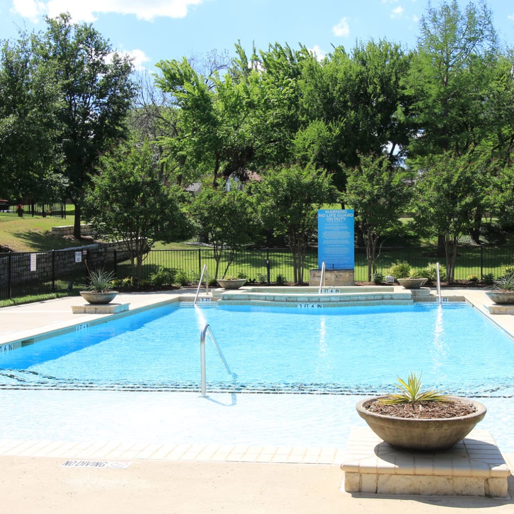 Fountains in the swimming pool at Oaks Estates of Coppell in Coppell, Texas