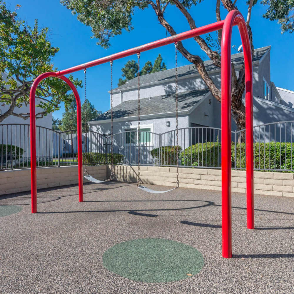Swings in the playground at Alicia Park in Laguna Niguel, California 