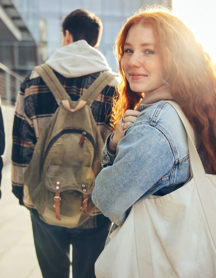 Student on her way to class near The Foundry in Ames, Iowa