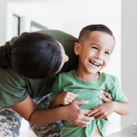 A mother and child at Dickinson Apartments in Springfield, Illinois