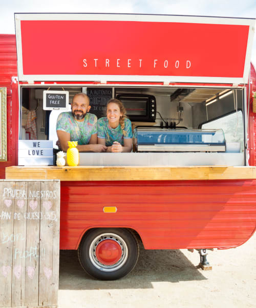 A man and woman working at a food card near Claremont Towers in Hillsborough, New Jersey