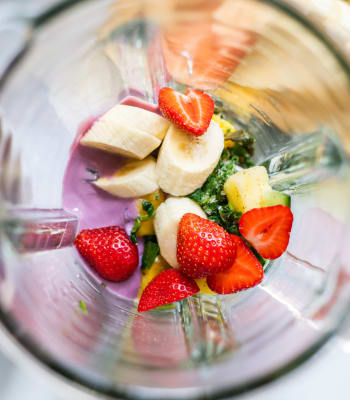 A healthy fruit smoothie being prepared near University Lofts at Greensborough Village, Jonesboro, Arkansas