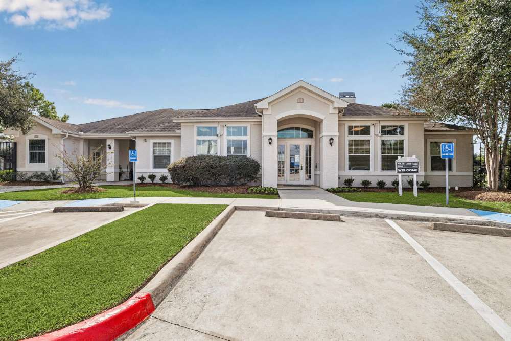 The exterior view of the apartments parking spaces at Kimberly Pointe in Houston, Texas