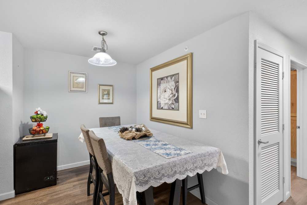 Charming dining area with elegant decor and warm lighting at Lakewood Crossing in Granbury, Texas.