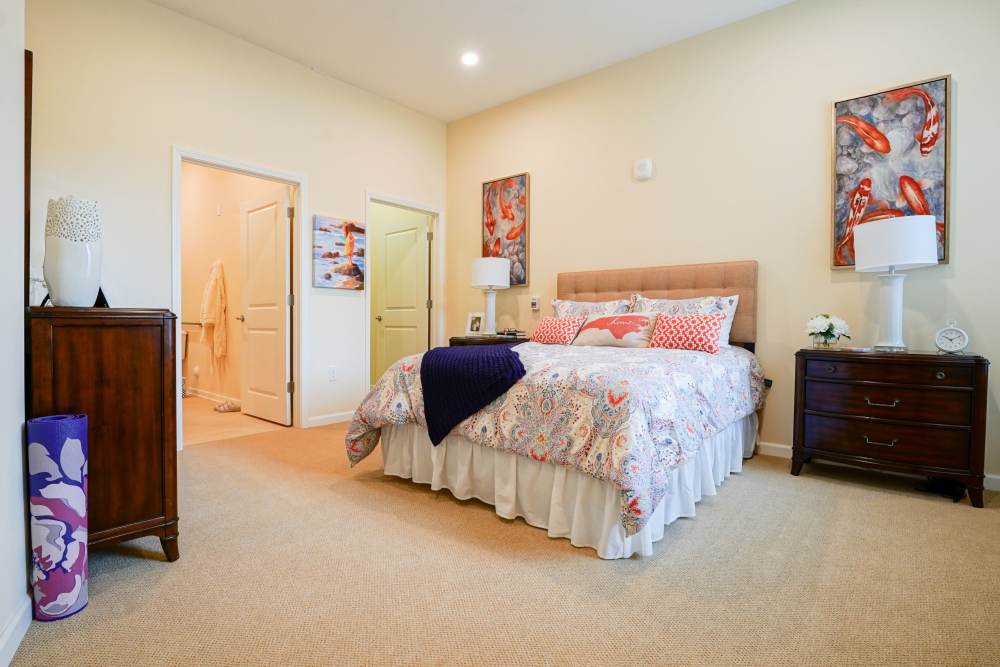 Modern and spacious bedroom at Harmony at Enterprise in Bowie, Maryland