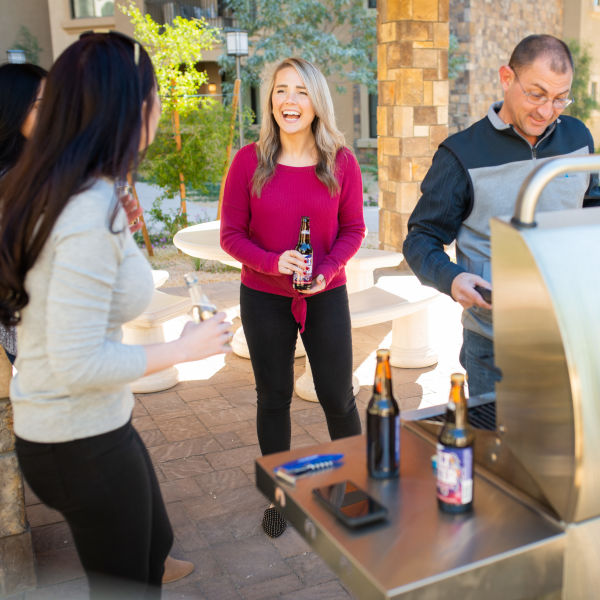 Residents firing up the gas grills and enjoying some beverages at San Hacienda in Chandler, Arizona