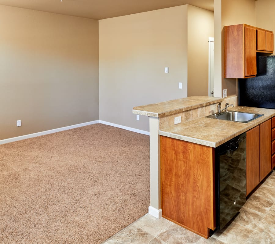 Spacious living room and beautiful kitchen at Orchard Ridge home in Salem, Oregon