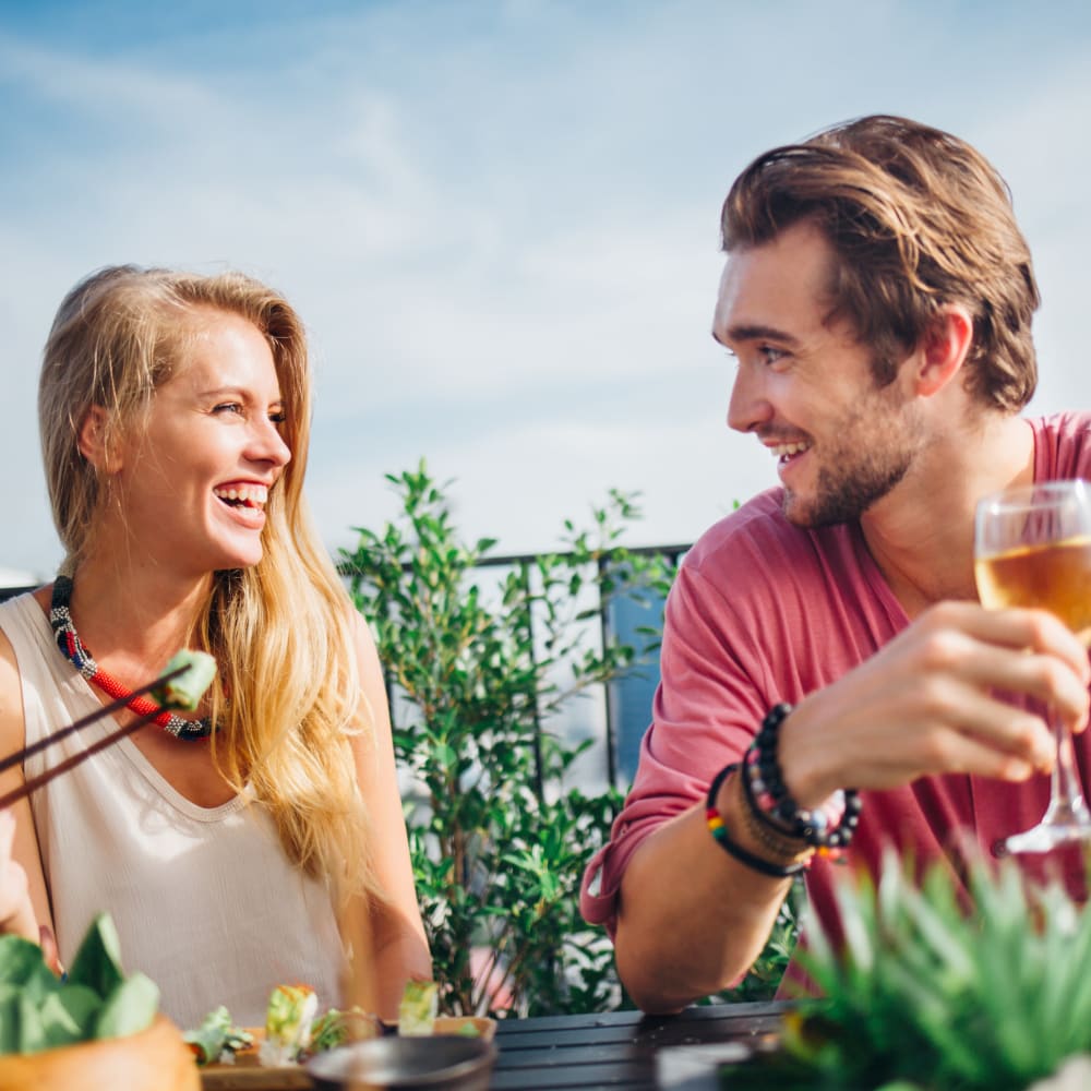 Couple out for sushi at a restaurant near The Columns at Westchase in Houston, Texas