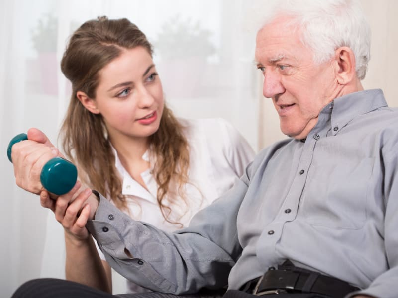 Resident and physical therapist doing exercises at Ingleside Communities in Mount Horeb, Wisconsin