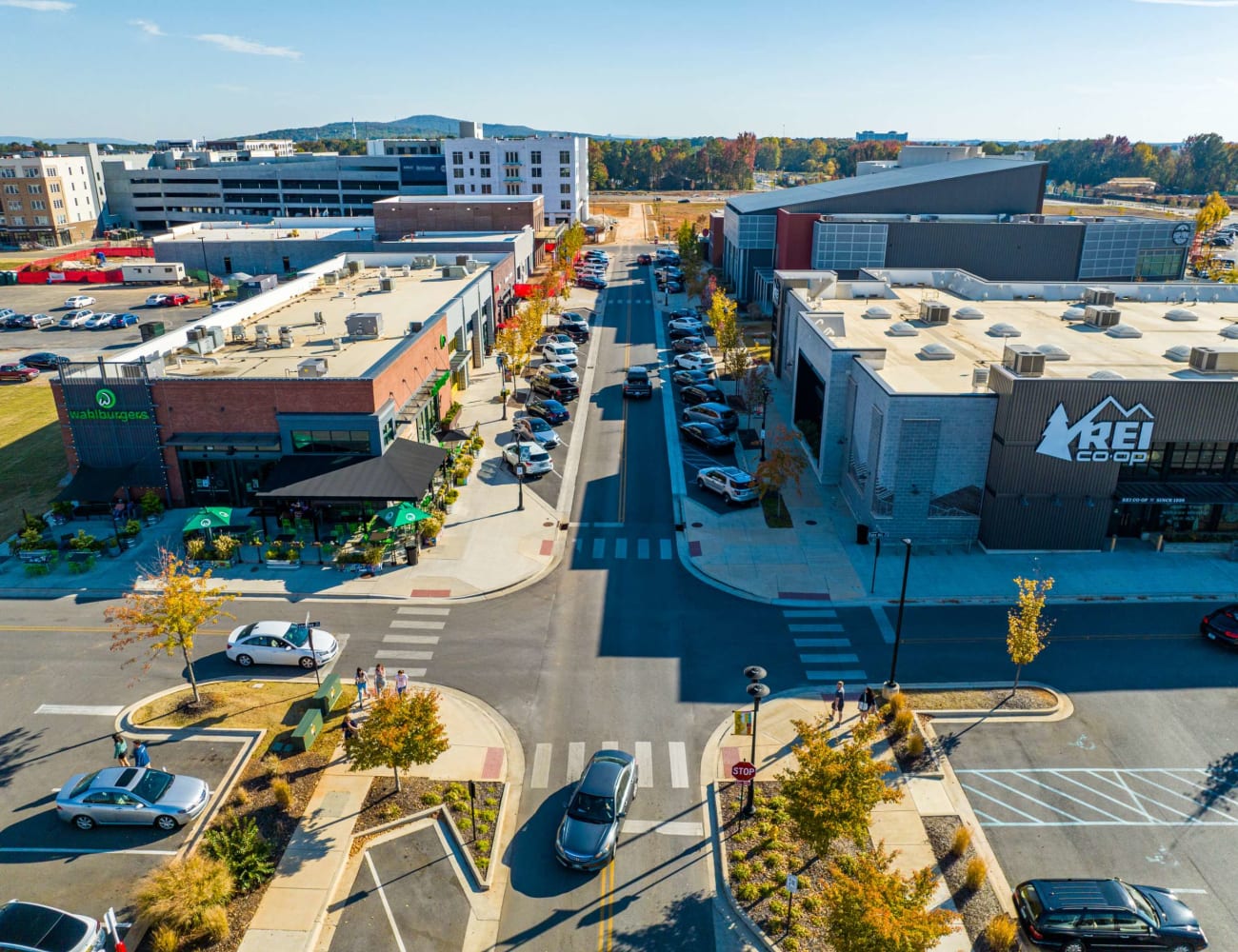 Residents gather in the MidCity Disctrict at Encore MidCity in Huntsville, Alabama