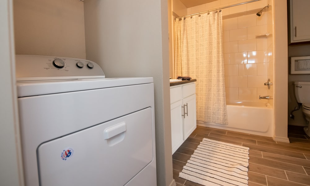 Washing machine at Portico at Friars Creek Apartments in Temple, Texas