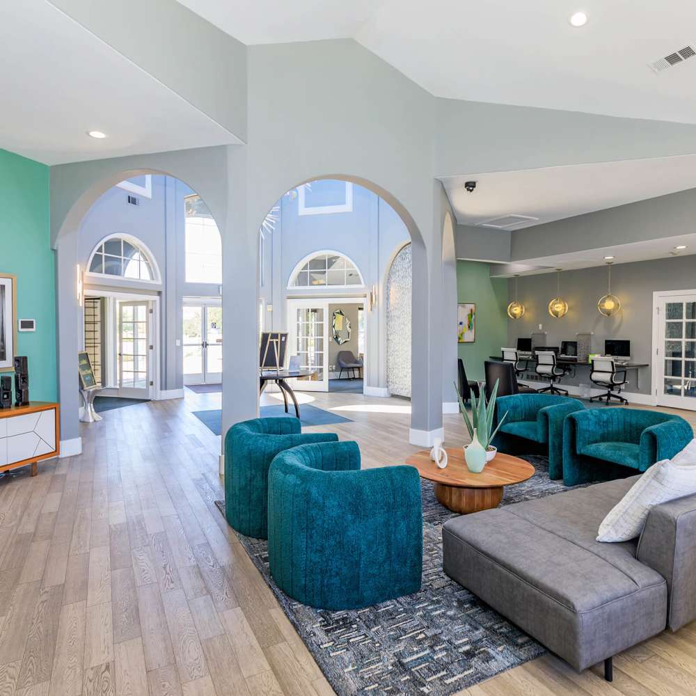 Clubhouse with plenty of seating at One Belmar Place in Lakewood, Colorado