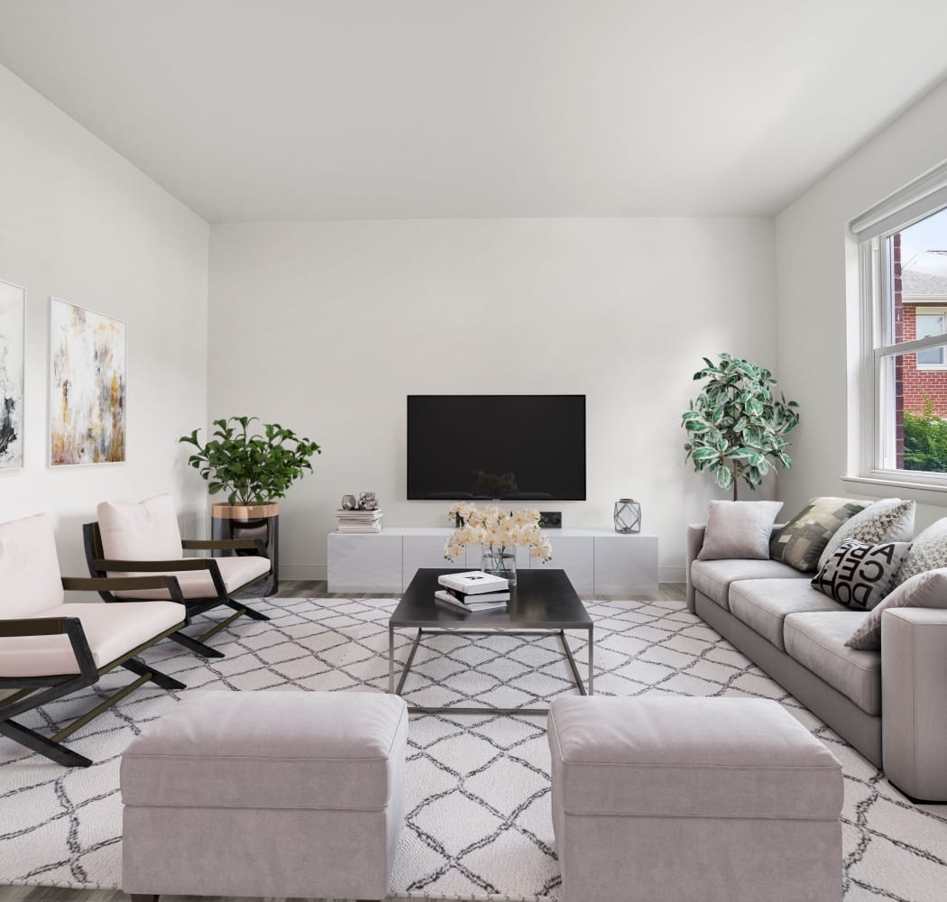 Model living room with tasteful accents at Greenwoods in Brockton, Massachusetts