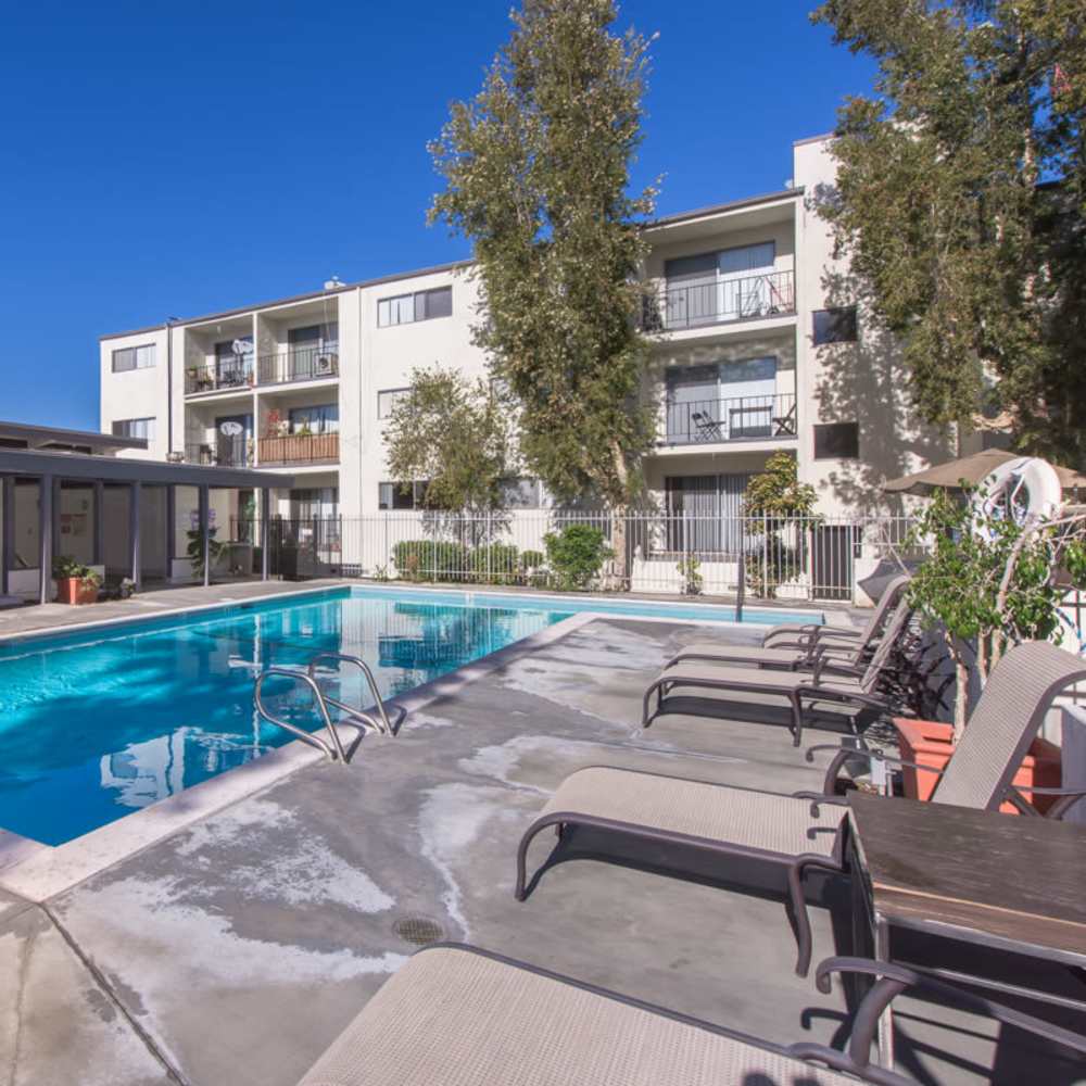 Pool with laid back chairs at Tarzana Springs in Tarzana, California