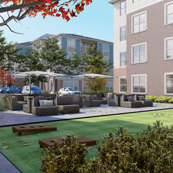 Outdoor lounge and games at Attain at Towne Centre, Fredericksburg, Virginia