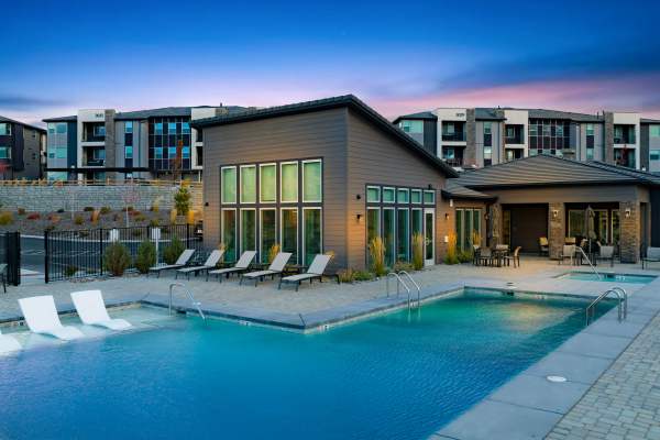 Apartment kitchen with stainless-steel appliances and granite countertops at Keystone Trailhead Village in Reno, Nevada