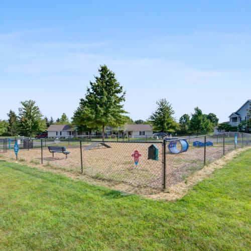 Fenced dog park at Oakmonte Apartments in Webster, New York