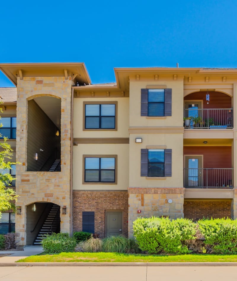 Exterior building view with large windows at Sorrel Phillips Creek Ranch in Frisco, Texas