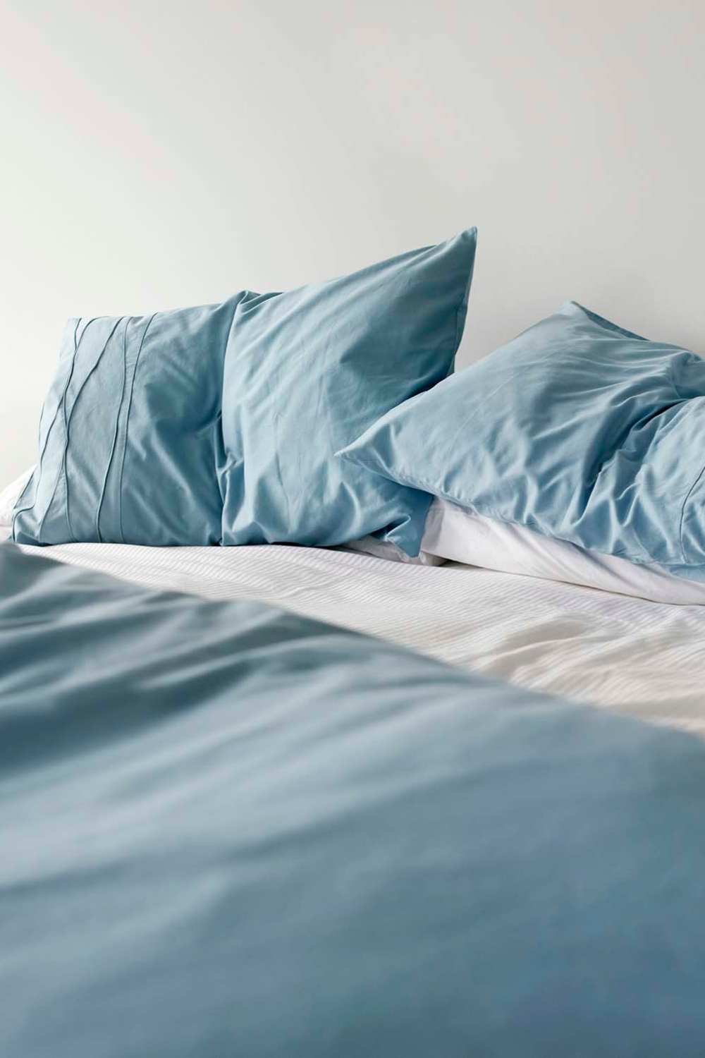 Large comfortable bed at 300 Optimist Park in Charlotte, North Carolina