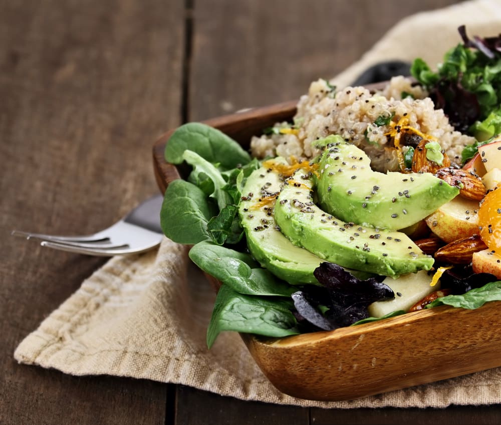 Healthy salad with quinoa and avocado prepared at a restaurant near Mia in Palo Alto, California