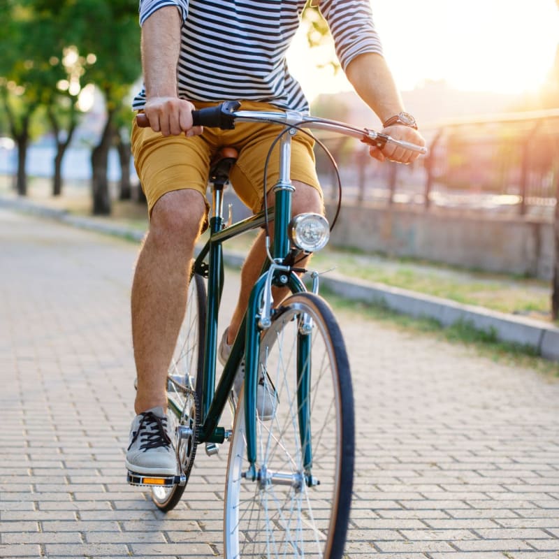 A resident rides his bike on a path near Attain at Bradford Creek, Huntsville, Alabama