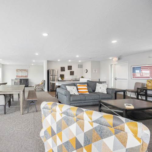 Community room with couch and chairs at Grand View Place in Grand Rapids, Michigan
