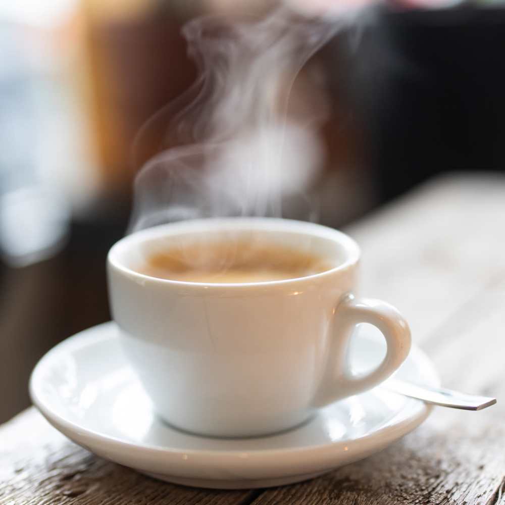 New white coffee cup with steam at Commonwealth Landing Lofts in Fall River, Massachusetts