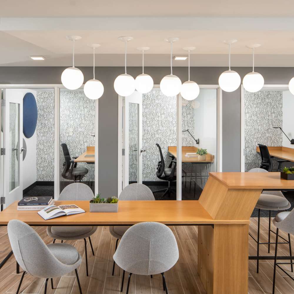 Work space and meeting room in clubhouse at Oaks Pentagon Village in Edina, Minnesota