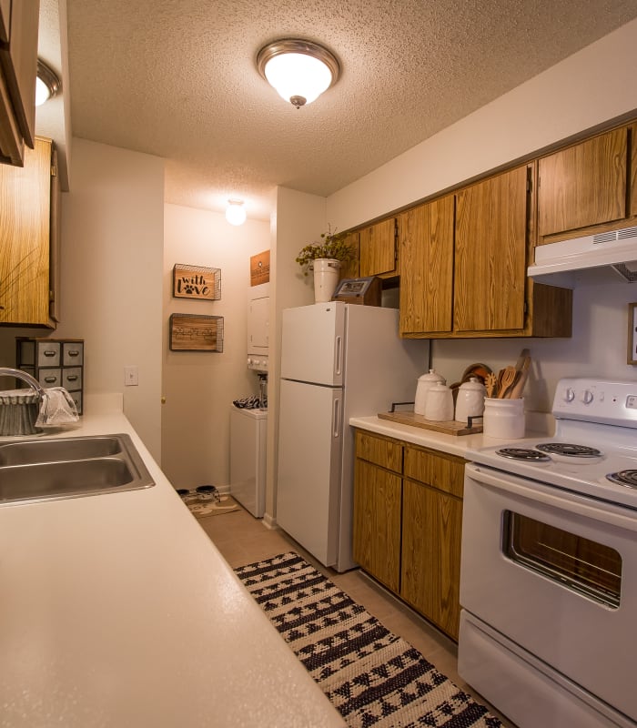 Kitchen with granite countertops at Waters Edge in Oklahoma City, Oklahoma