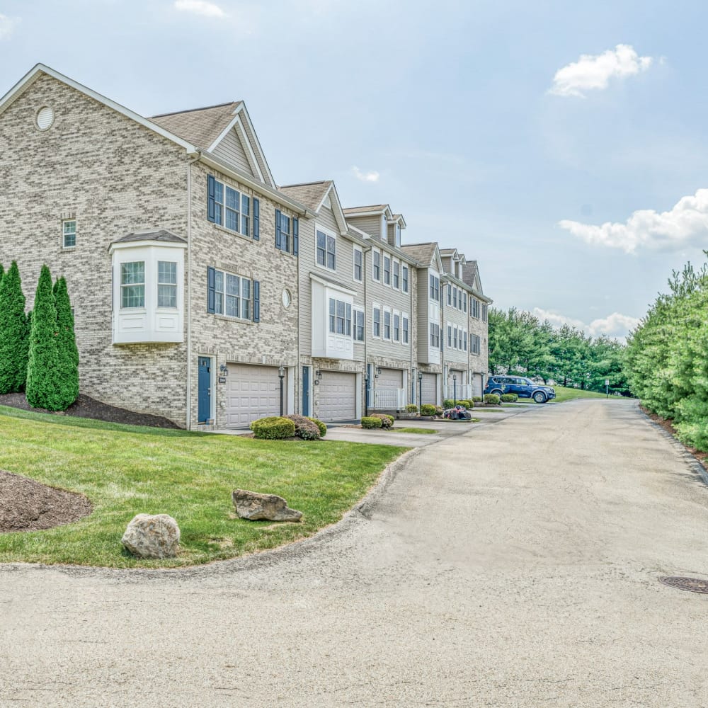 Apartments surrounded by lush green landscaping at Walton Crossings, Jeannette, Pennsylvania