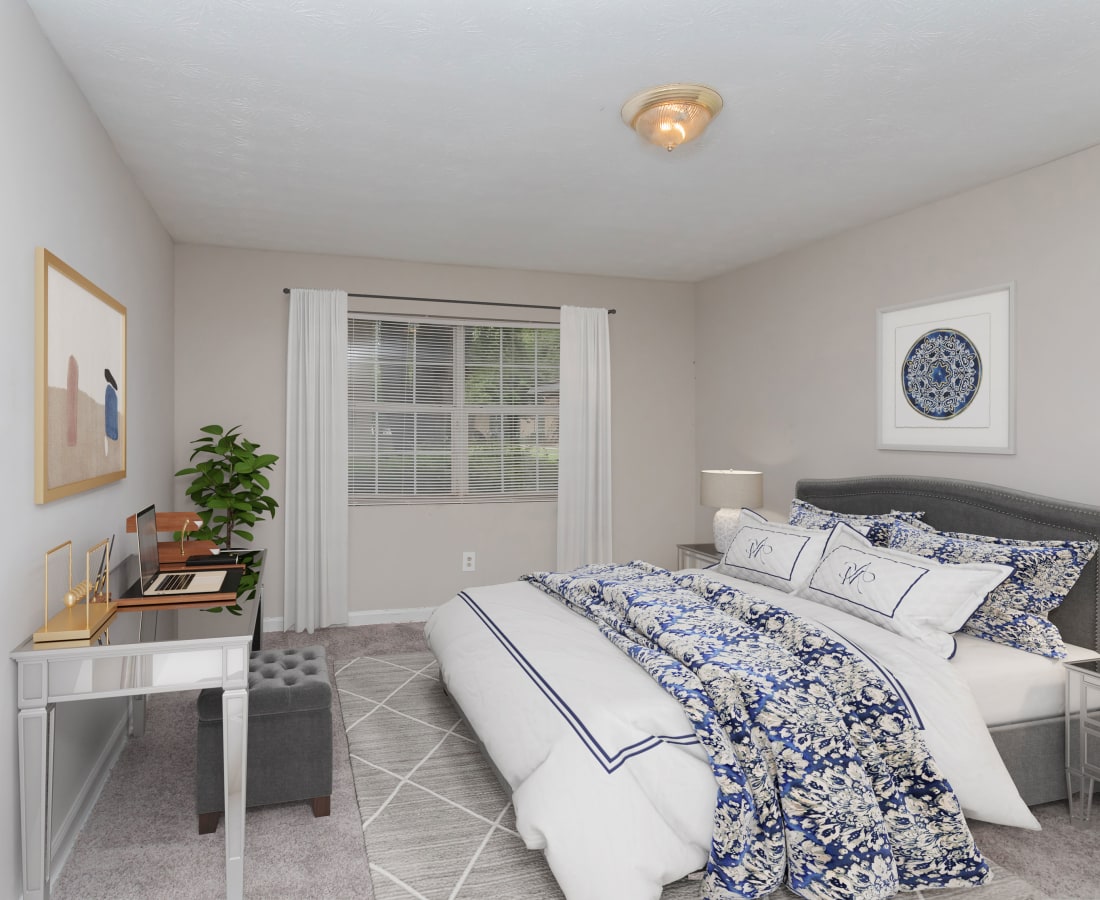  A furnished townhome bedroom at Commons at Briarwood Park in Brookhaven, Georgia