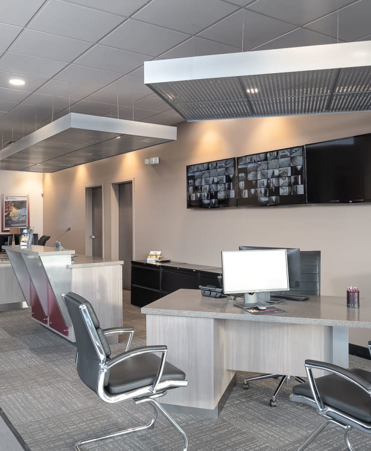 Desks and chairs in the leasing office at StorQuest Self Storage in Van Nuys, California