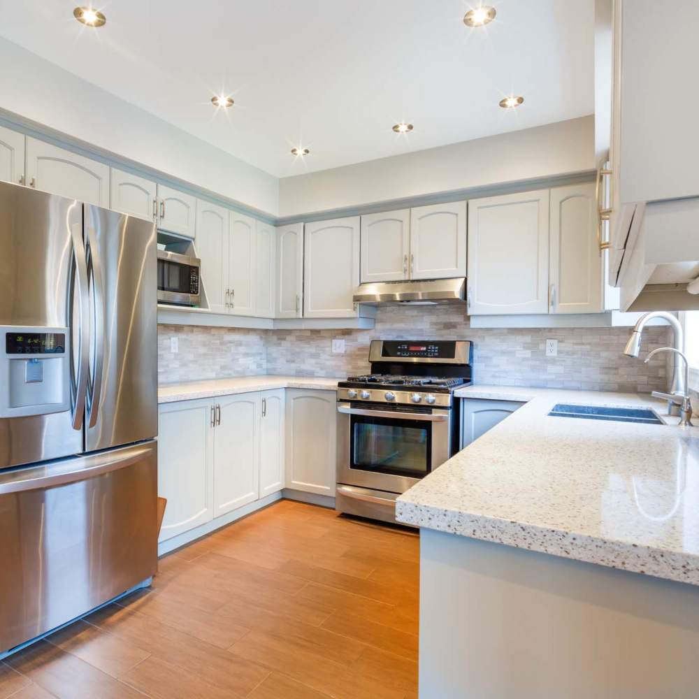 Upgraded kitchen with stainless steel appliances and modern finishes at Antioch Family & Senior Apartments in Antioch, California