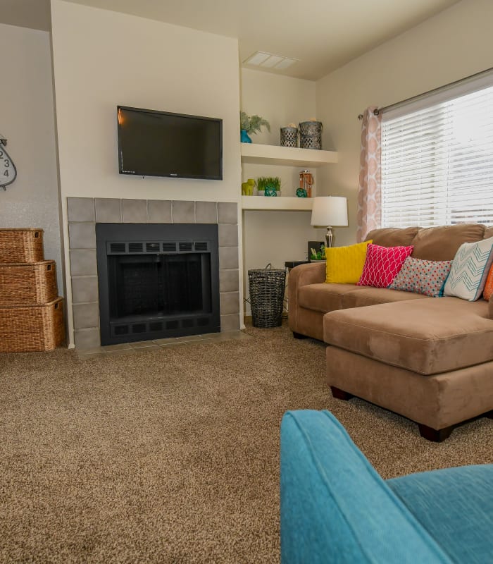 Spacious living room with large windows at Sheridan Pond in Tulsa, Oklahoma