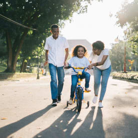 Residents playing at the playground HighPointe Apartments in Birmingham, Alabama