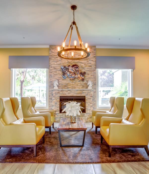 Clubhouse lounge and fireplace at Hawthorn Village Apartments in Napa