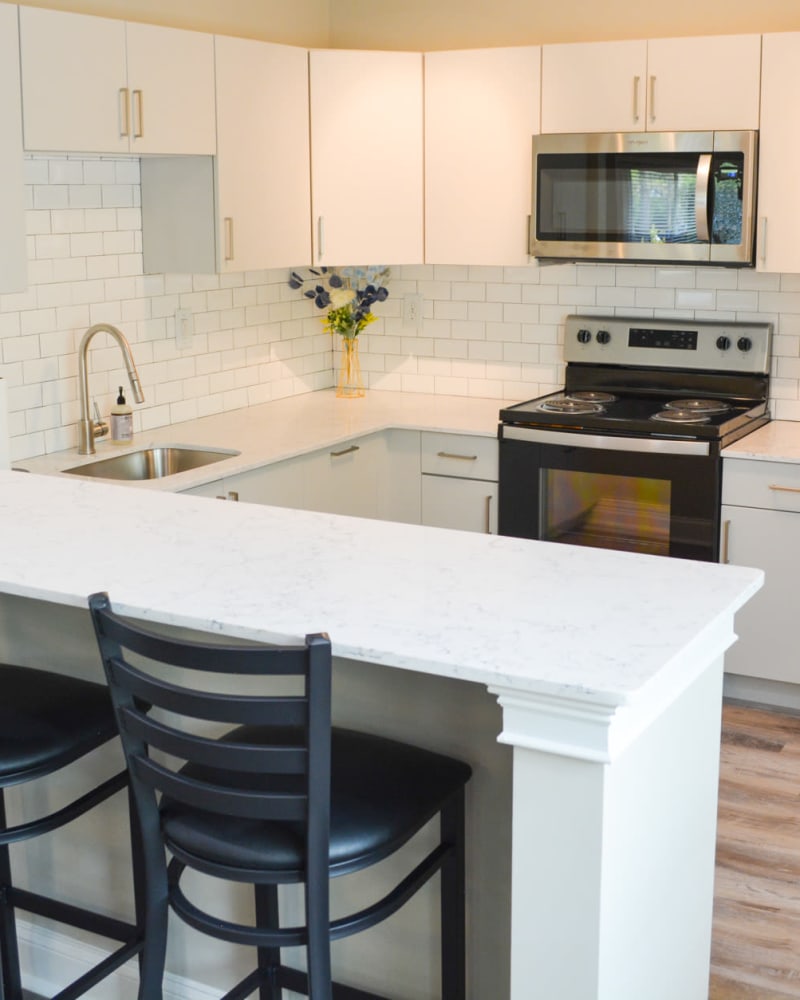 Apartment kitchen at The Village at Voorhees in Voorhees, New Jersey
