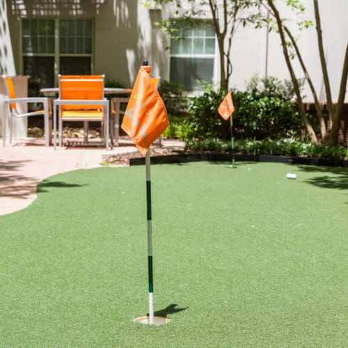 Putting green near BBQ area at Marq on Ponce in Atlanta, Georgia