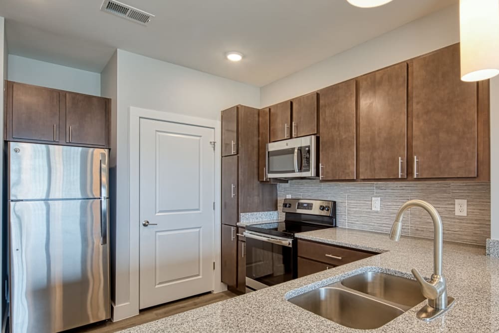 An open kitchen with lots of natural lighting at Marina Villa in Norfolk, Virginia