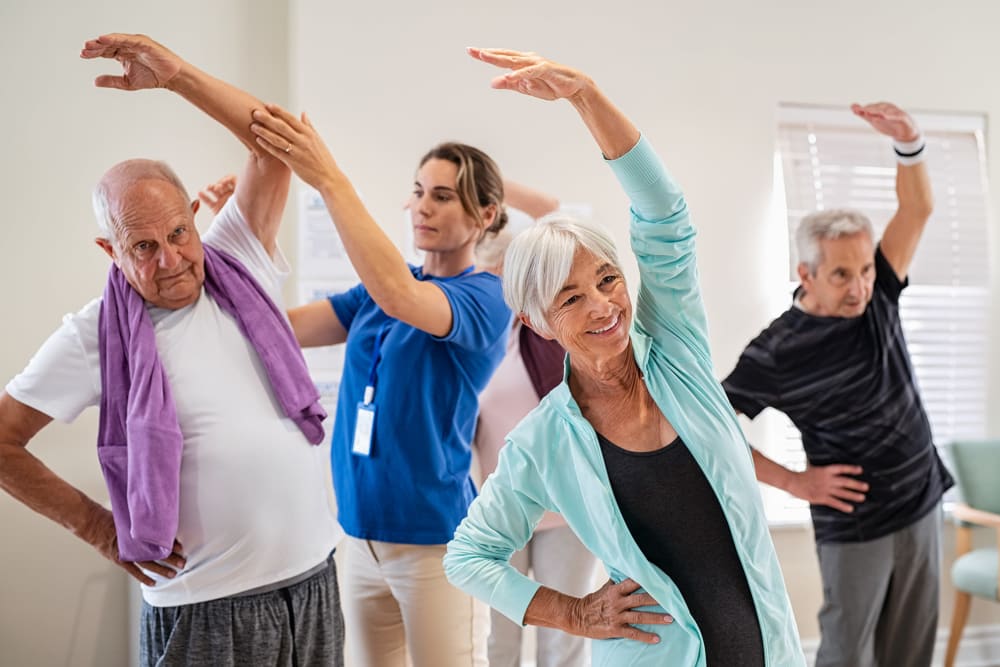 Residents doing yoga at Regency at Puakea in Lihue, Hawaii