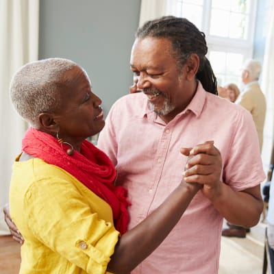 Two residents dancing at Arbor Glen Senior Living in Lake Elmo, Minnesota