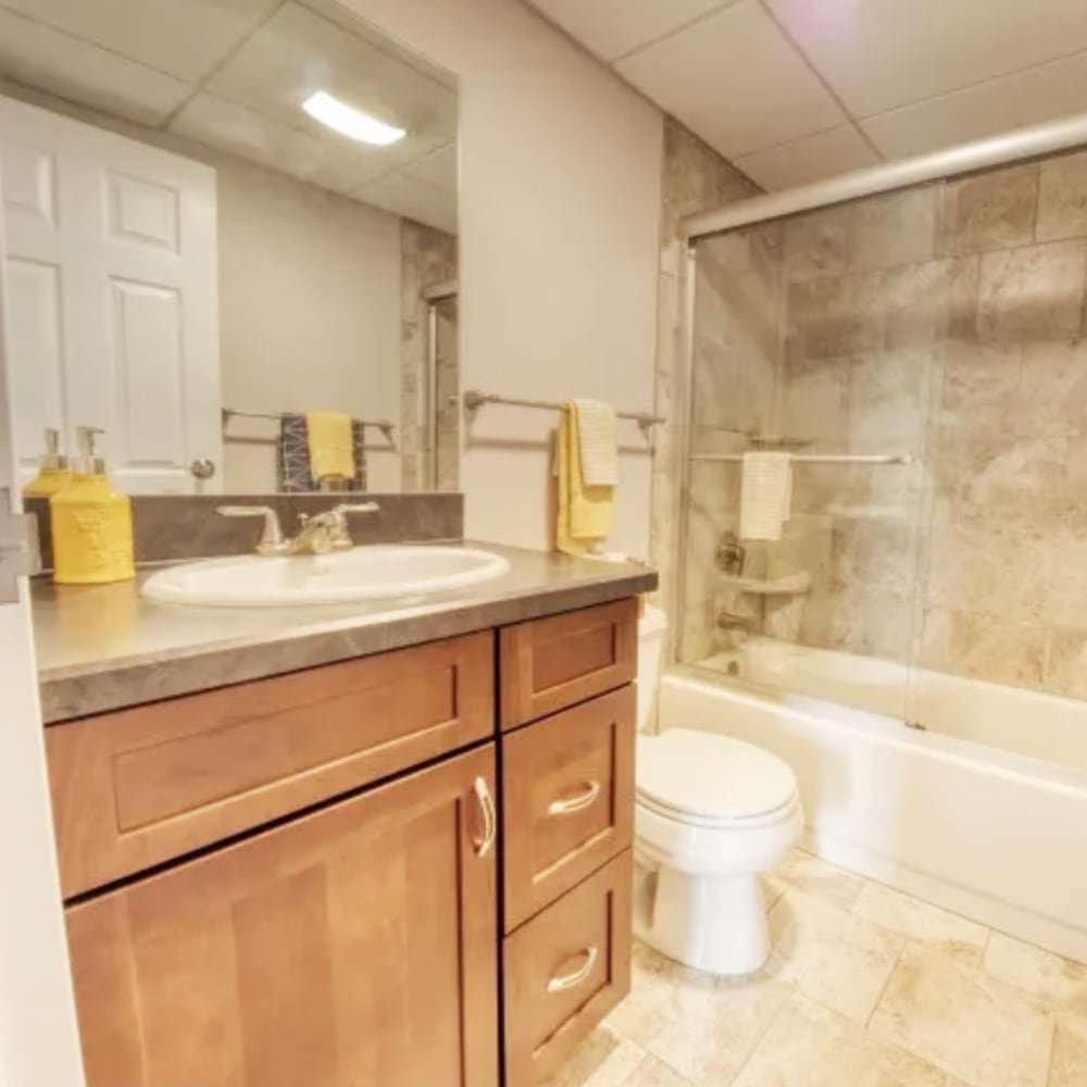 Bright bathroom at Del Coronado Apartments in St. Louis,Missouri