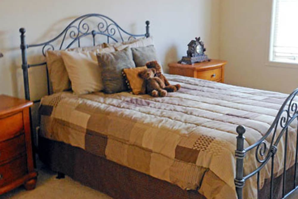 Serene resident bedroom at Majestic Rim Retirement Living in Payson, Arizona.